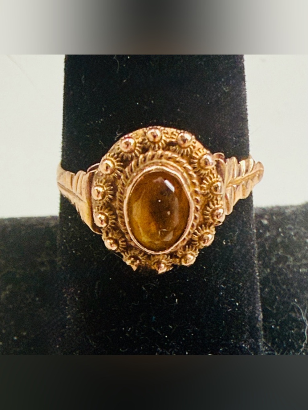 Portuguese Gold Cocktail Ring with an Amber Stone in center

 
Still GORGEOUS!